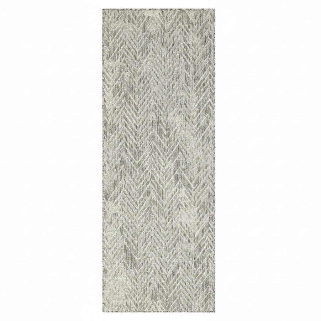 Patterned rug with a zigzag design on a white background