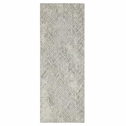 Patterned rug with a zigzag design on a white background