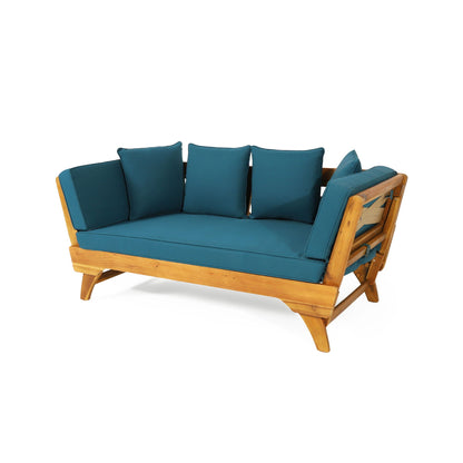 Wooden sofa with teal cushions on a white background