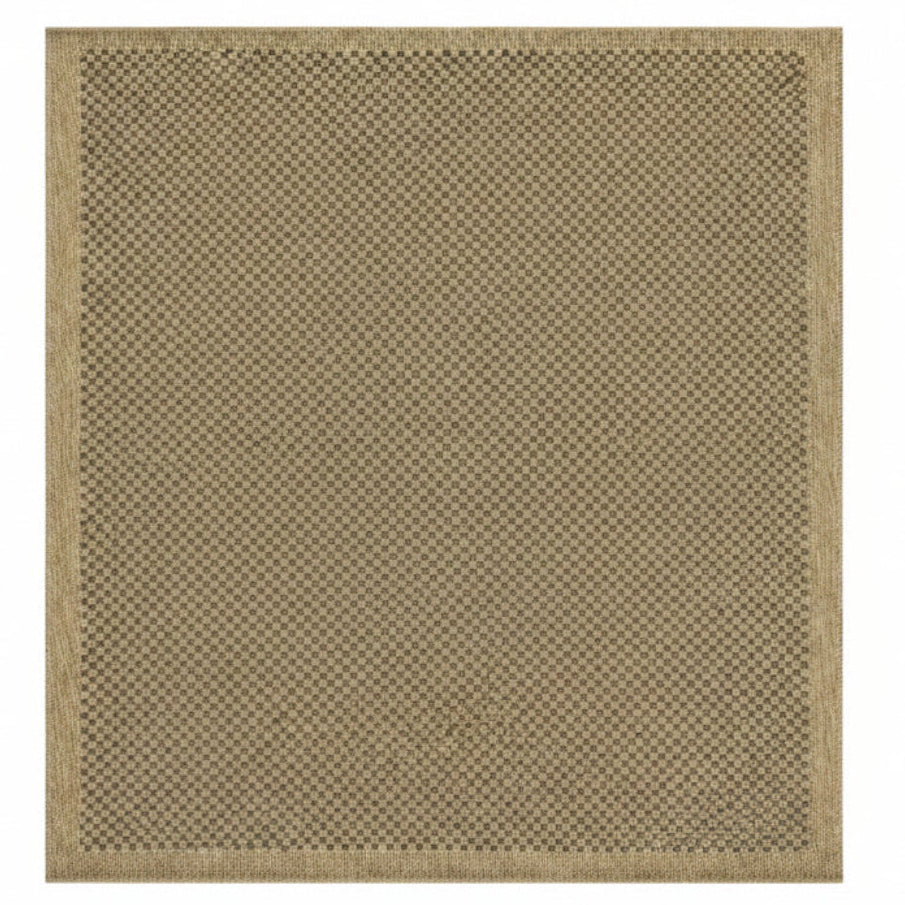 Beige woven rug with a subtle pattern on a white background