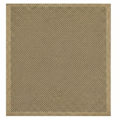 Beige woven rug with a subtle pattern on a white background