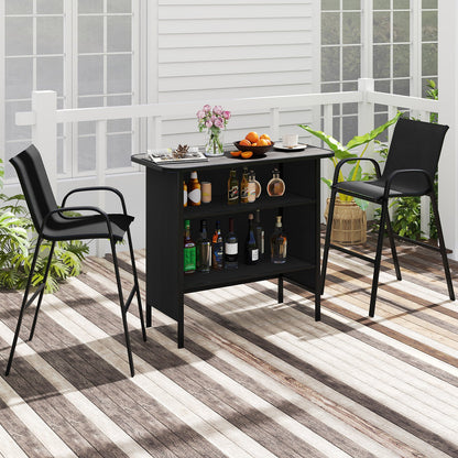 Black outdoor bar set with two high chairs on a wooden deck.