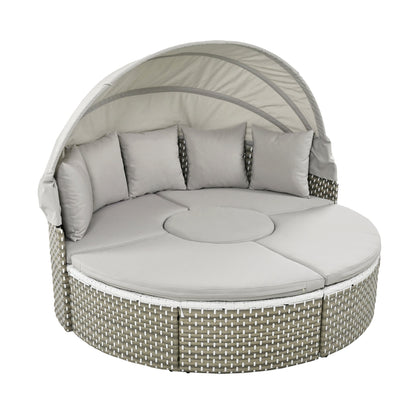 Round outdoor daybed with canopy and cushions on a white background