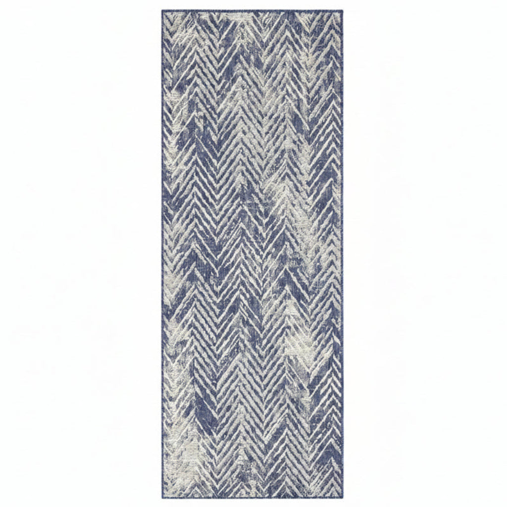 Rug with blue and white chevron pattern