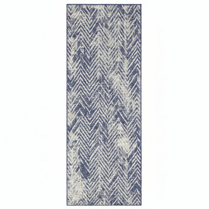 Rug with blue and white chevron pattern