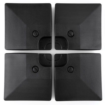 Four black square objects with embedded screws on a white background