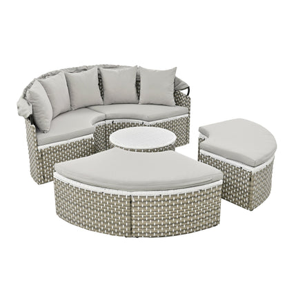 Outdoor patio furniture set with cushions on a white background