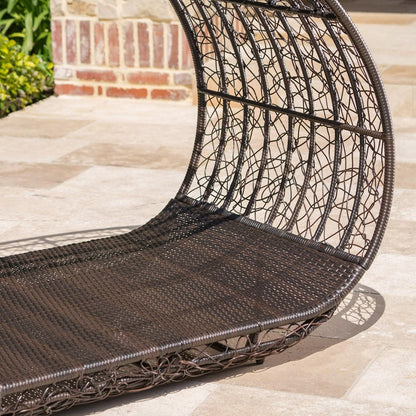 Close-up of a wicker hanging chair on a patio