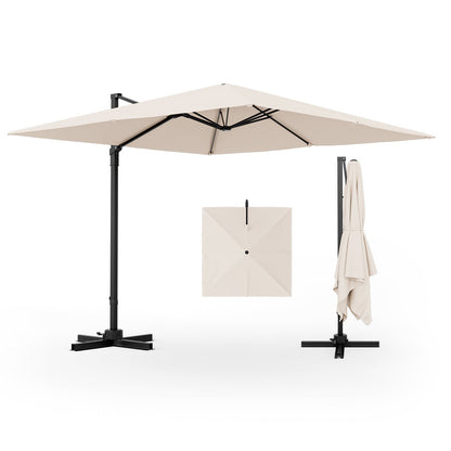Beige patio umbrella with black stand on a white background