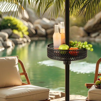 Outdoor setting with a small table by a poolside, featuring bottles and fruits.