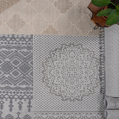 Patterned rugs with geometric and medallion designs on a neutral background.