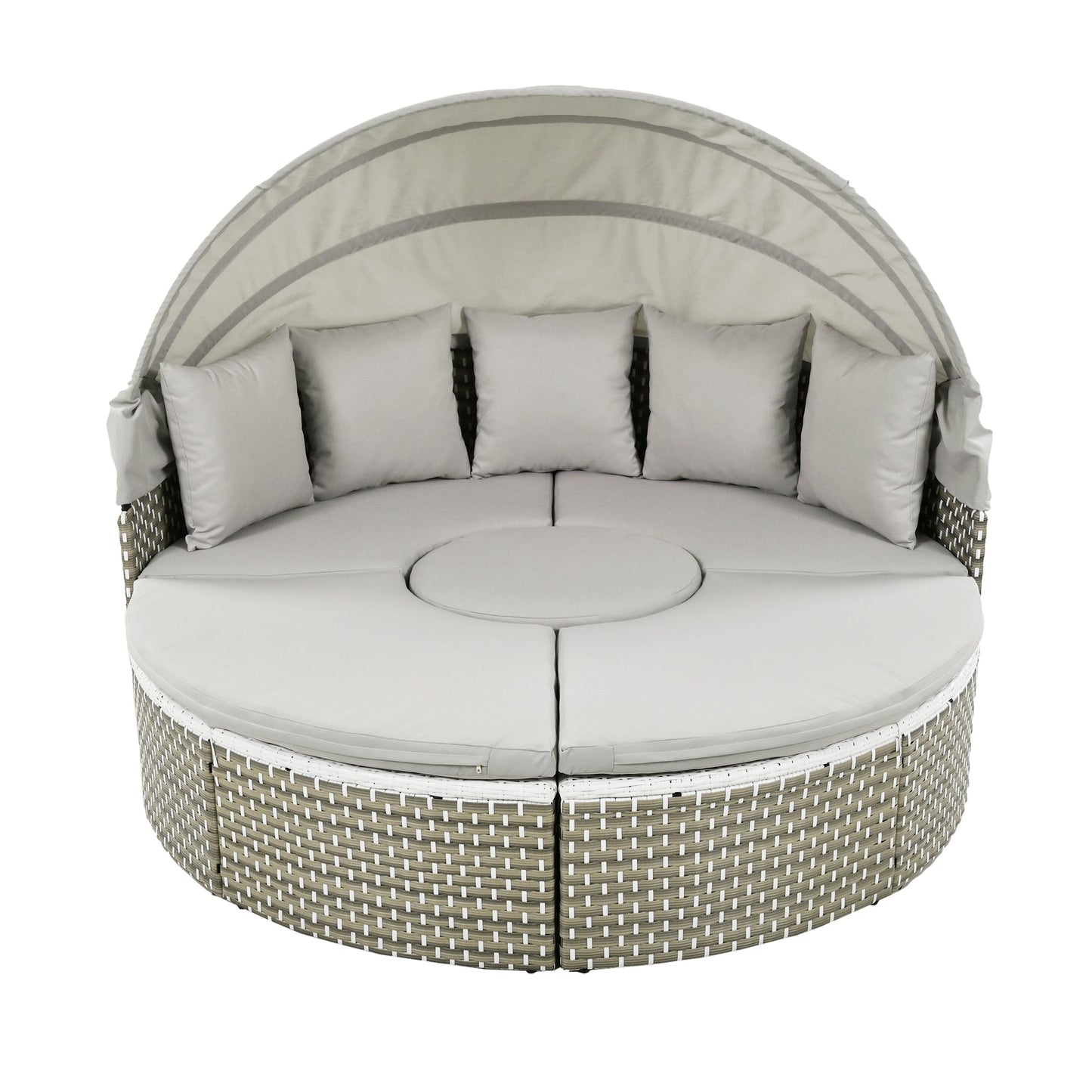 Round outdoor daybed with cushions on a white background