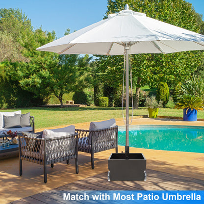 Outdoor patio set with chairs and a large umbrella by a pool