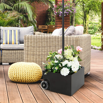 Outdoor seating area with wicker furniture, cushions, and a planter with flowers on a wooden deck.