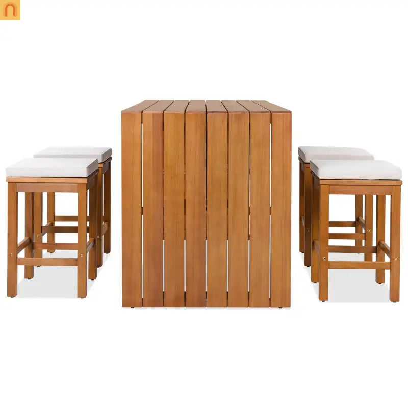 Wooden bar table with four matching stools on a white background